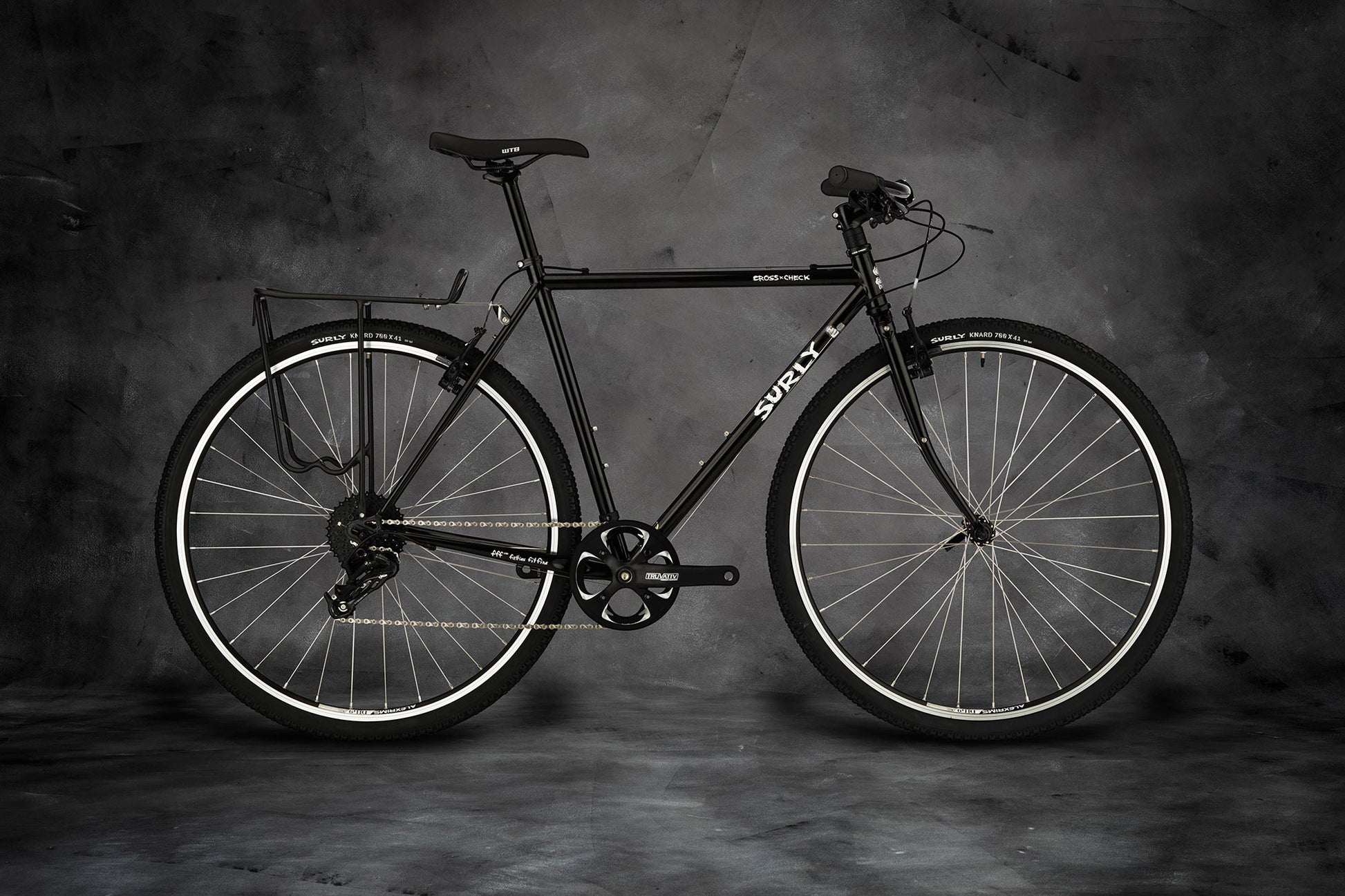 Surly Cross-Check flat bar bike Gloss Black color side view
