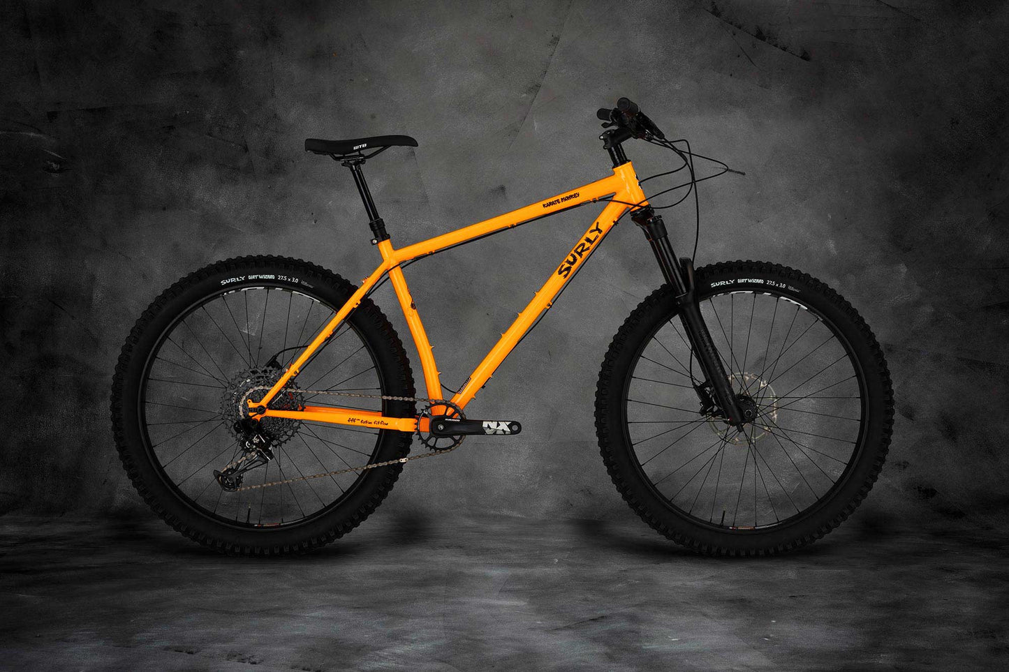 Surly Karate Monkey bike with suspension fork Toxic Tangerine color side view