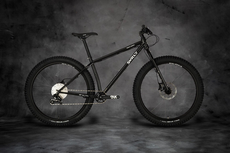 Surly Karate Monkey bike with rigid fork Hi-Viz Black color side view