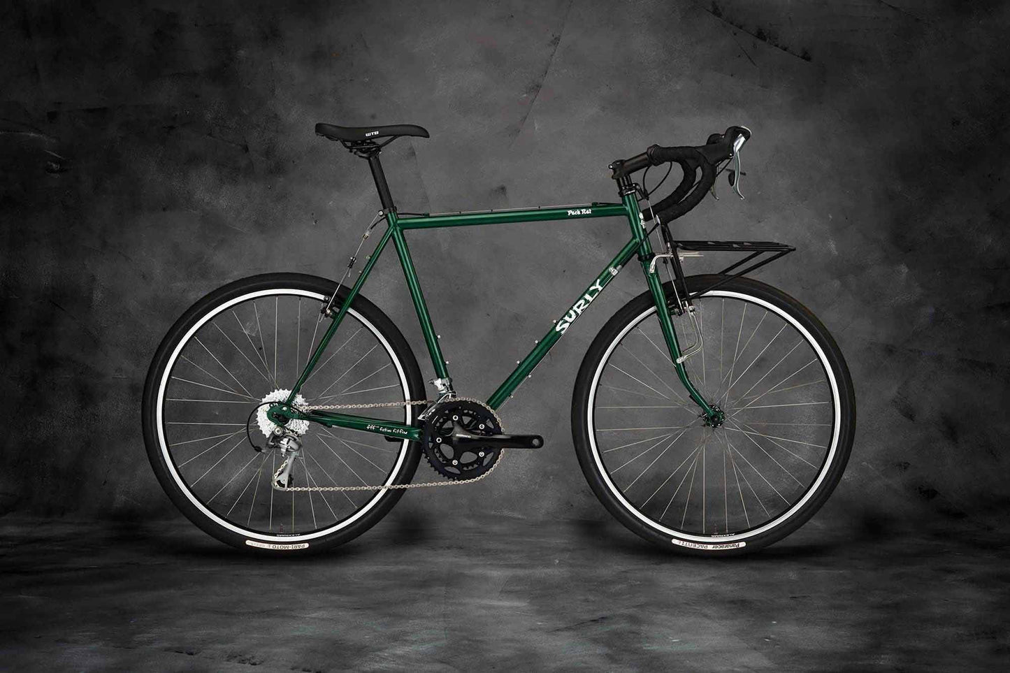 Surly Pack Rat bike side view with front 24-Pack Rack Get In Green color