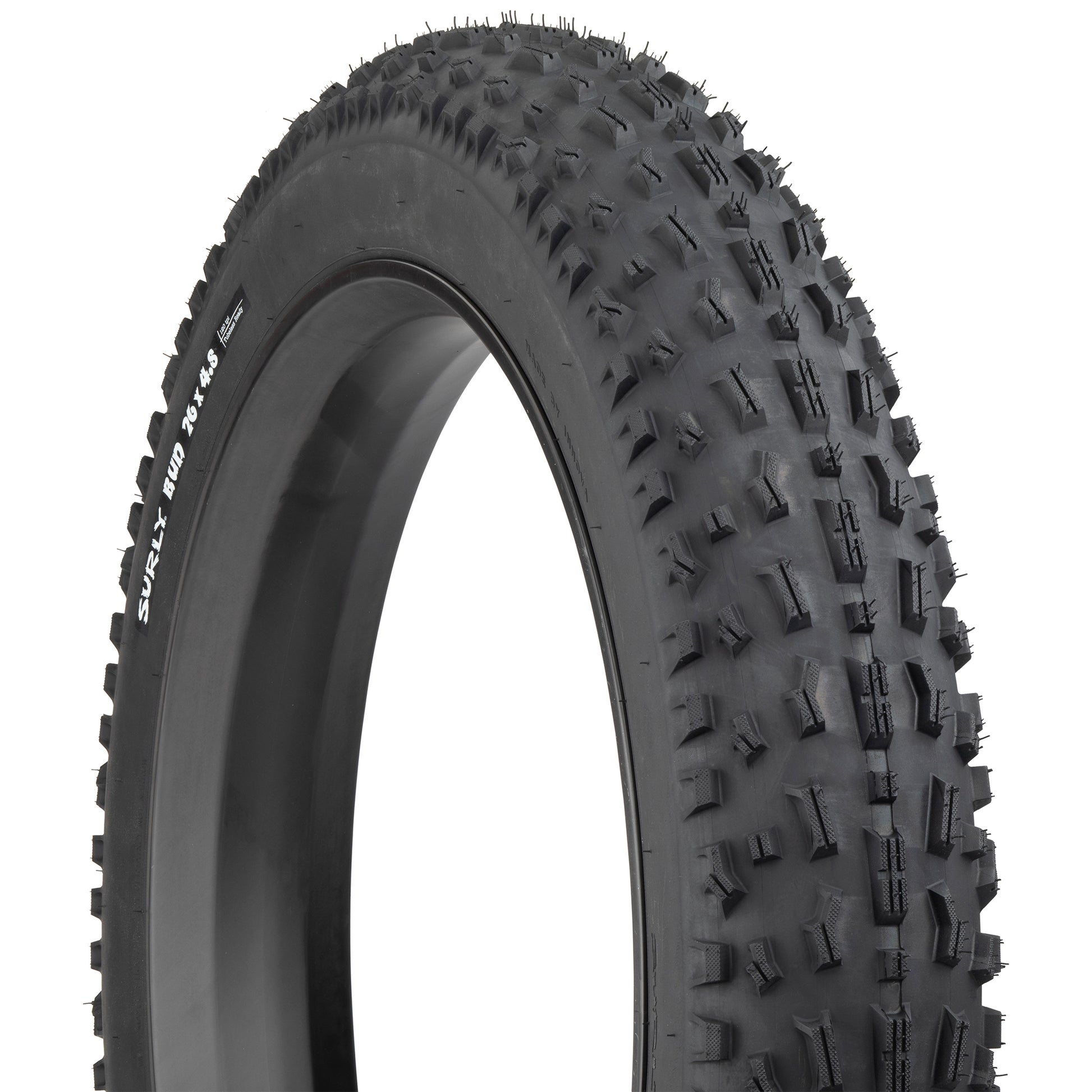 Surly Bud Tire three-quarter view showing tread and sidewall close-up