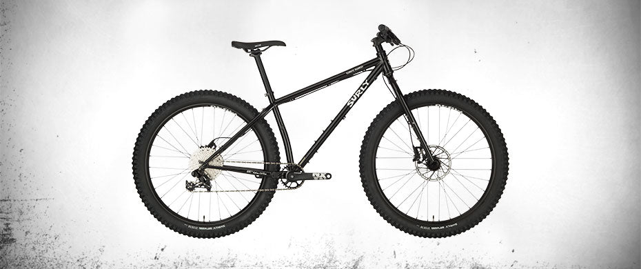 Surly Karate Monkey bike with rigid fork Hi-Viz Black color side view
