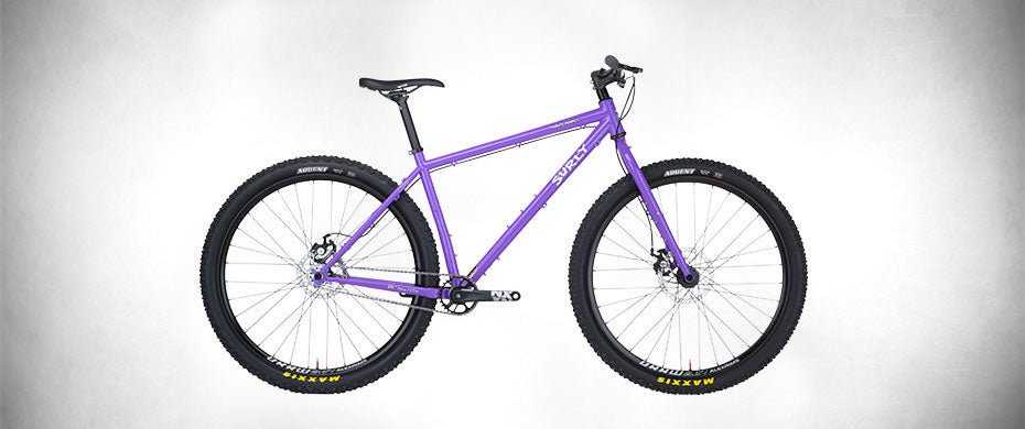 Surly Karate Monkey bike with rigid fork Stand Back Purple color side view
