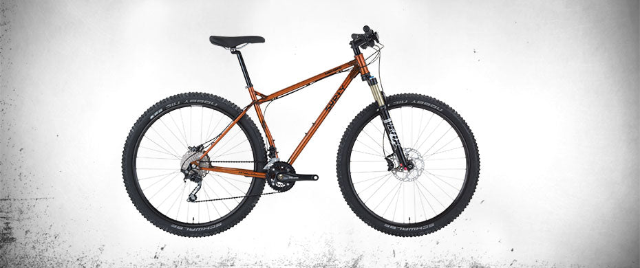 Surly Karate Monkey bike with suspension fork Spray Tan color side view