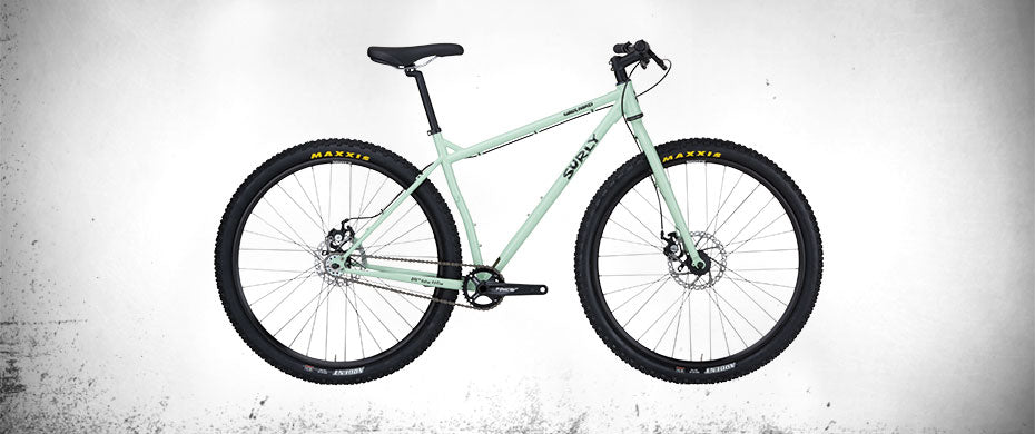 Surly Karate Monkey bike with rigid fork Mint Green color side view