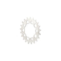 Surly stainless steel chainring with laser etched logo on white background