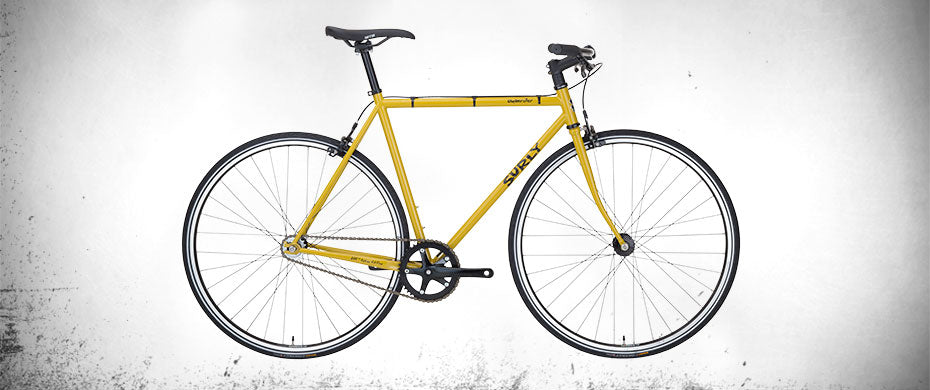 Surly Steamroller bike side view in Drink More Water Yellow color