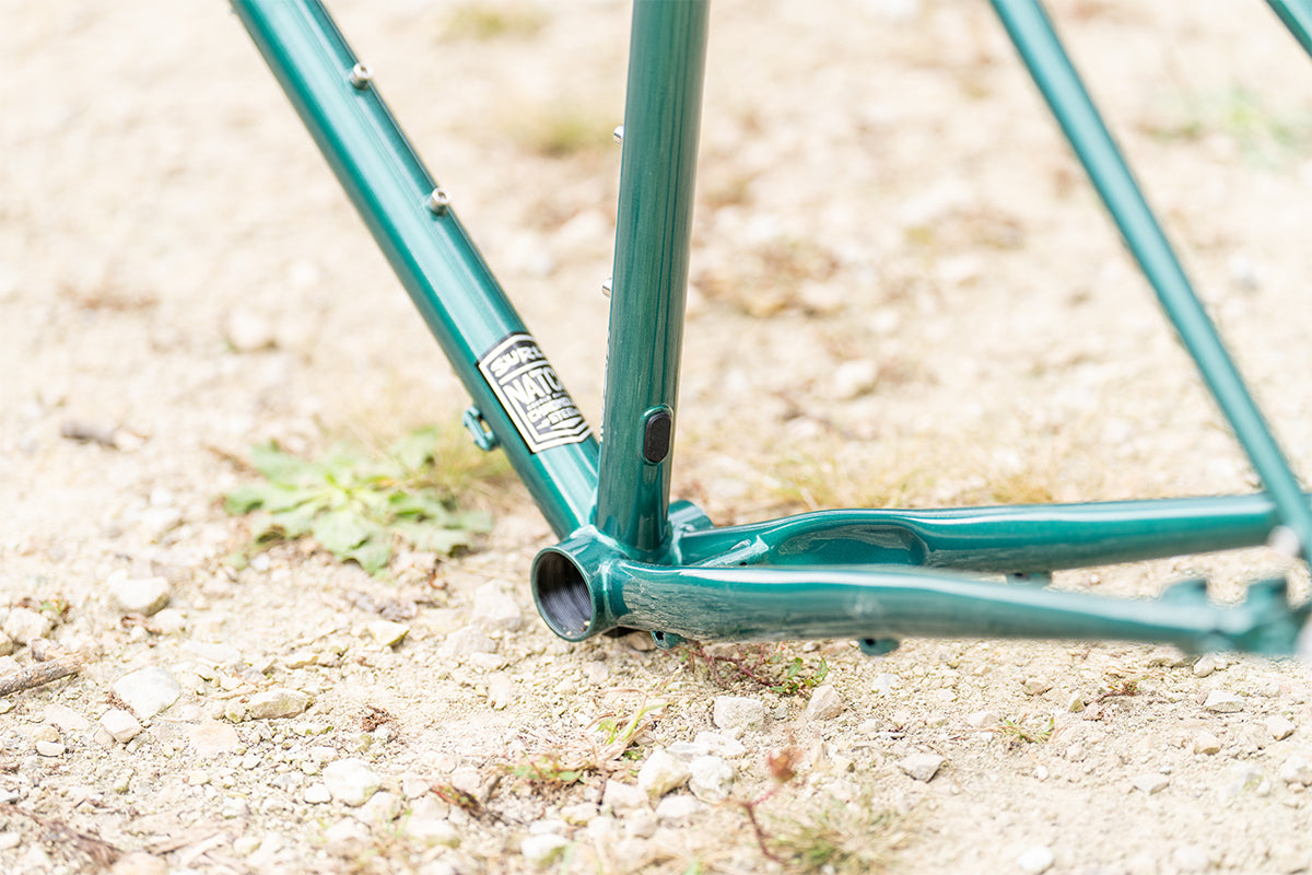 Surly Straggler Frameset in Subtropic Algae color detail view of bottom bracket area and dropper post routing port