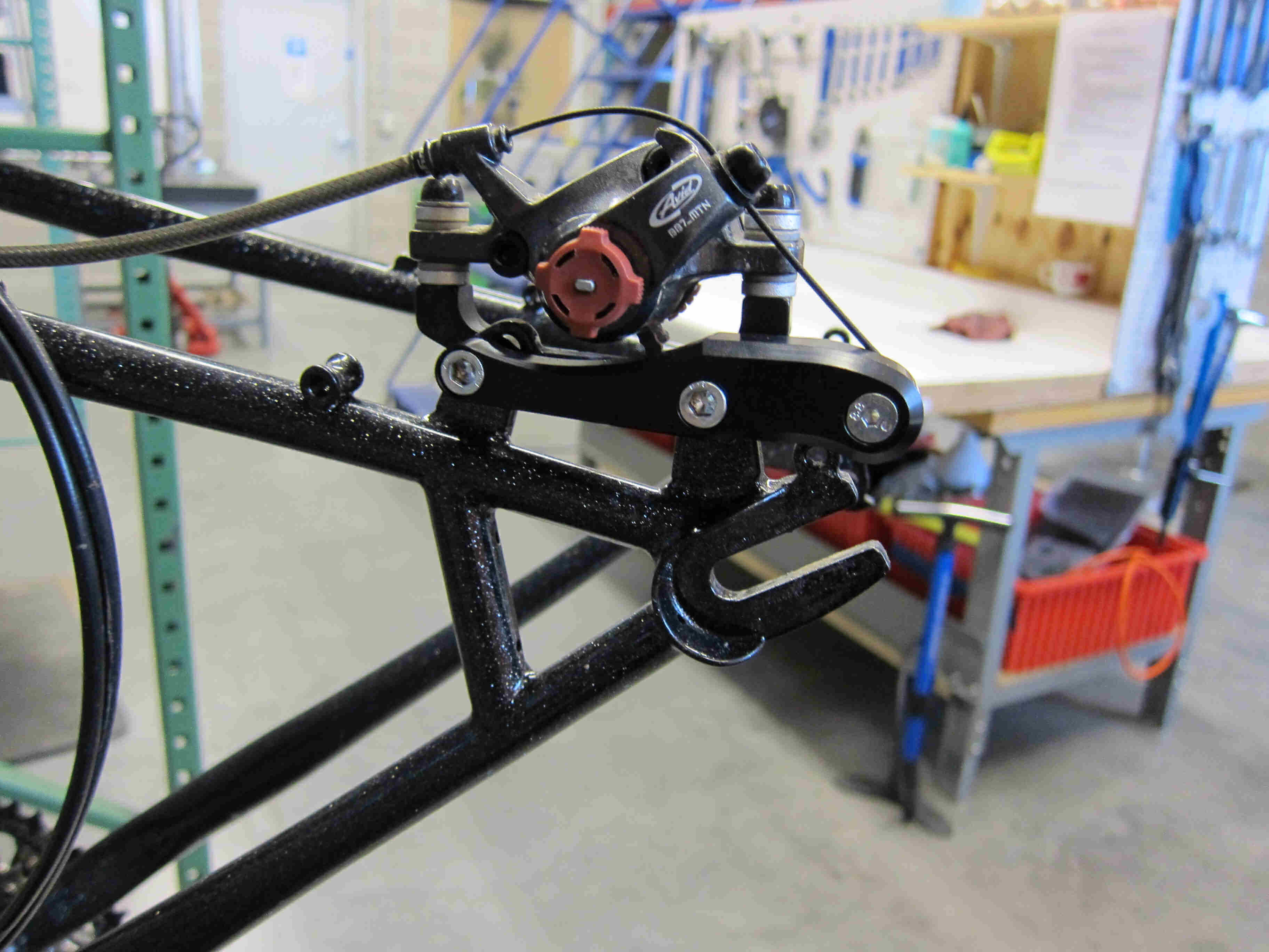 Left side view of a Surly Moonlander fat bike frame, focused over the rear dropouts