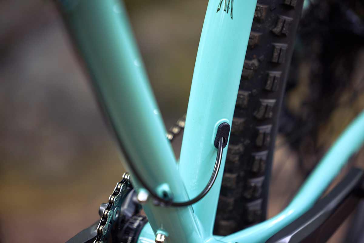 Surly Krampus front suspension bike in Blue Oyster Coat detail of dropper post routing on seat tube