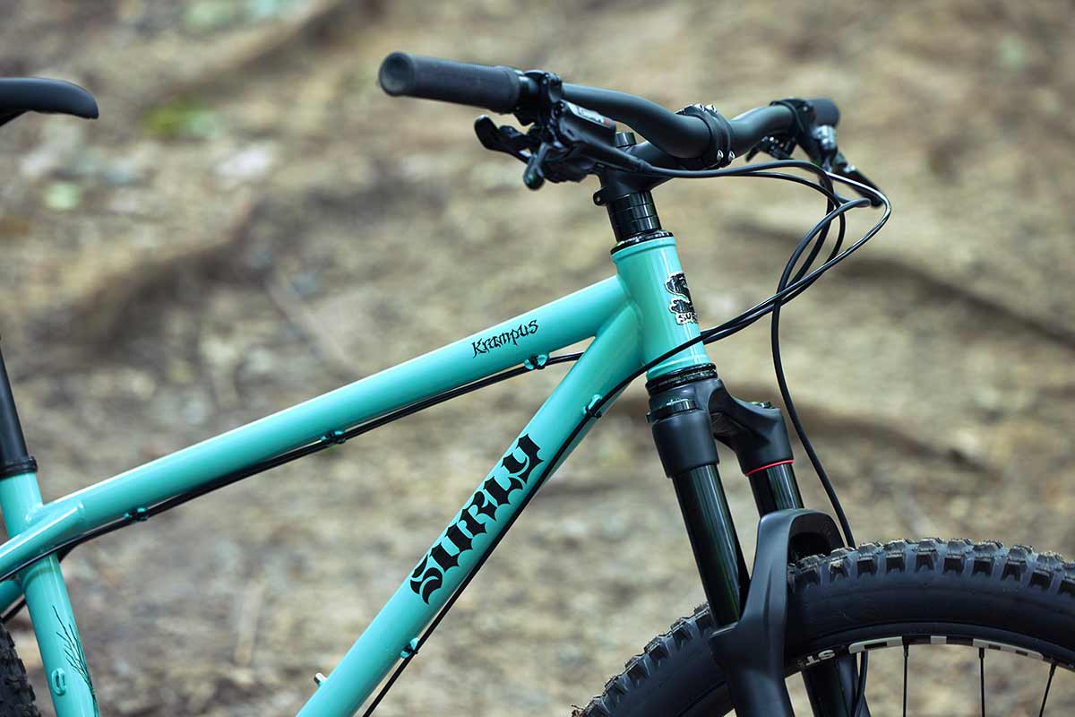 Surly Krampus front suspension bike in Blue Oyster Coat front end detail showing handlebar, head tube and fork