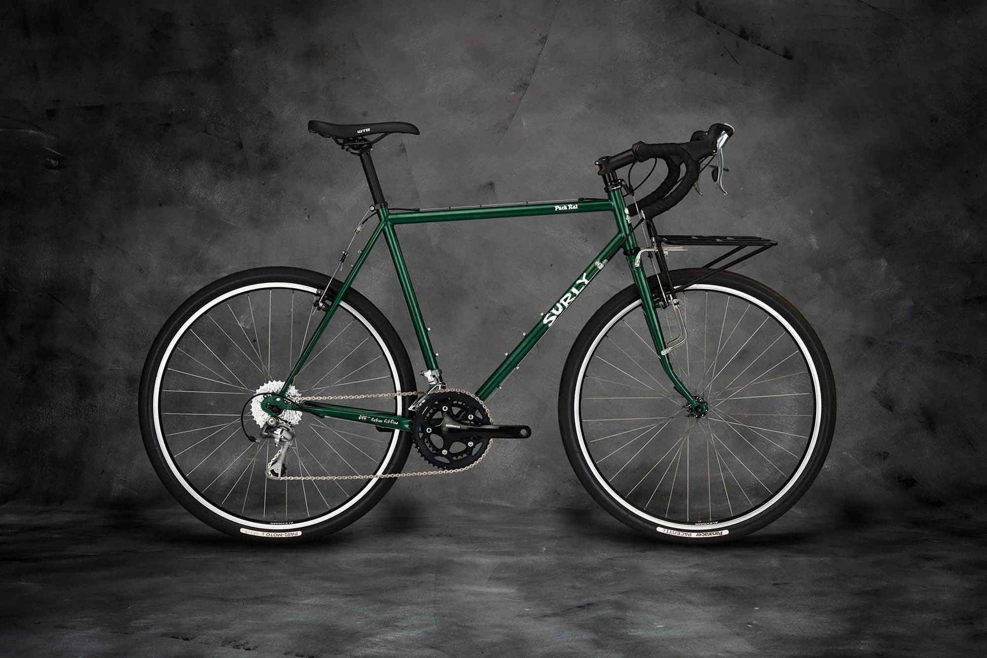 Surly Pack Rat bike side view with front 24-Pack Rack Get In Green color