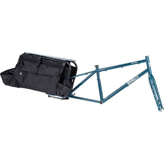 A teal blue cargo bike frame with a large black rear cargo bag attached, shown against a plain white background.