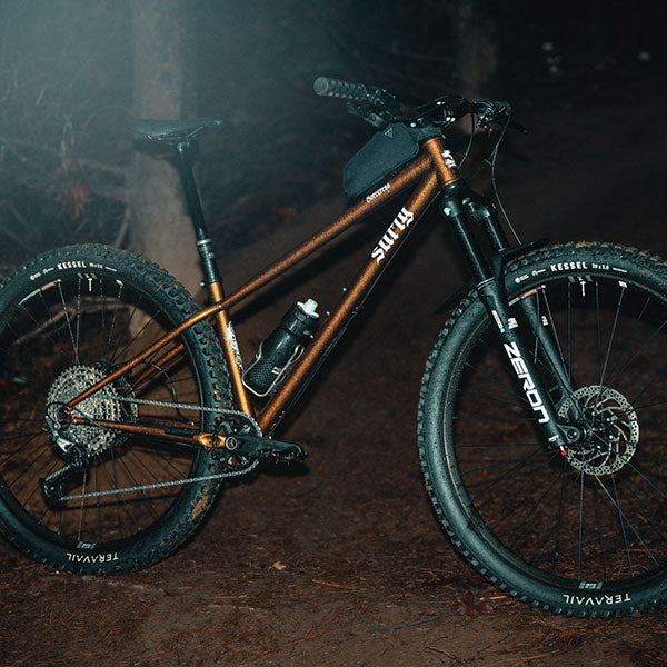 Mountain bike with 'Surly' branding on a dark background