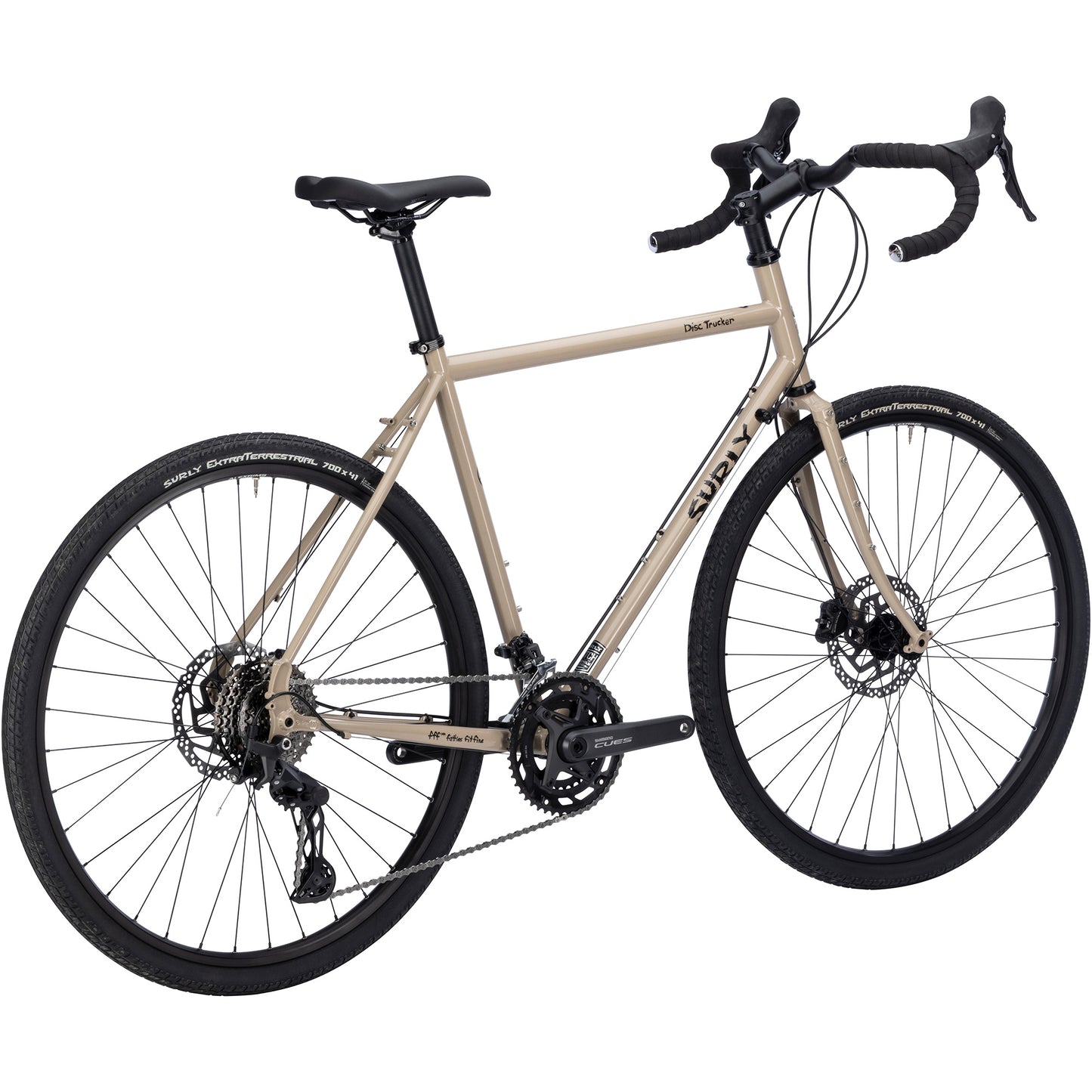 Surly Disc Trucker bike with 700c wheels in tan color rear three-quarter view on white background