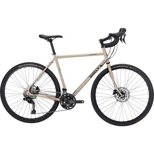 Surly Disc Trucker bike with 700c wheels  in tan color side view on white background