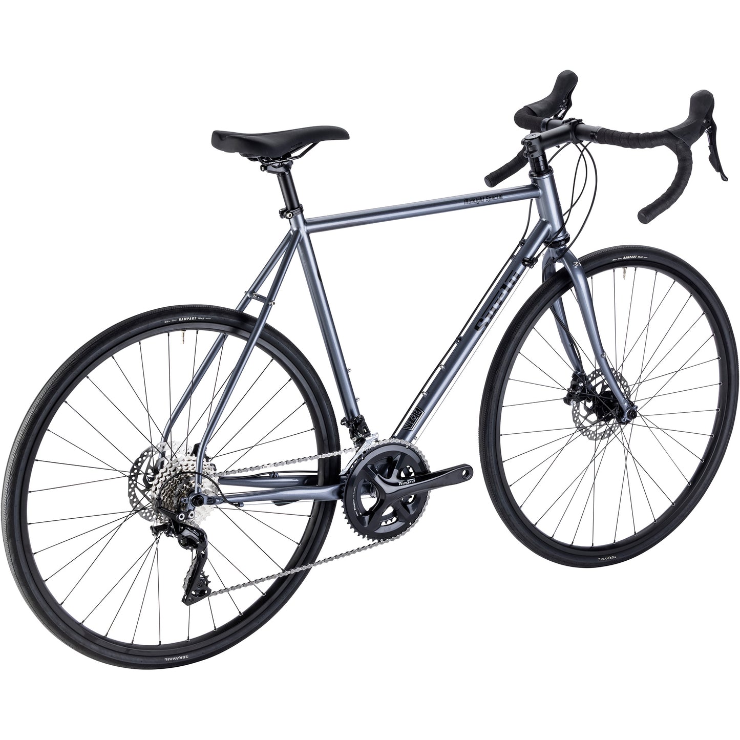 Surly Midnight Special bike rear three-quarter view in Stainless Teal color on a white background
