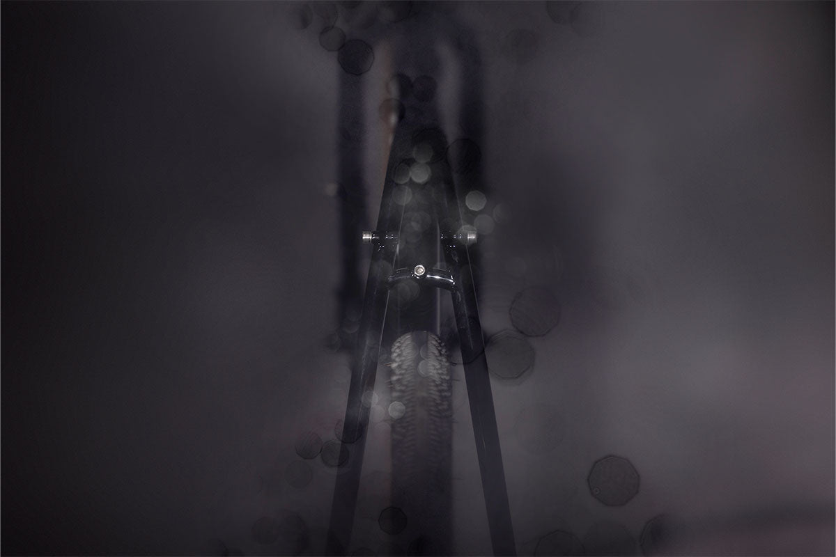 Bicycle in a dark, foggy environment with limited visibility