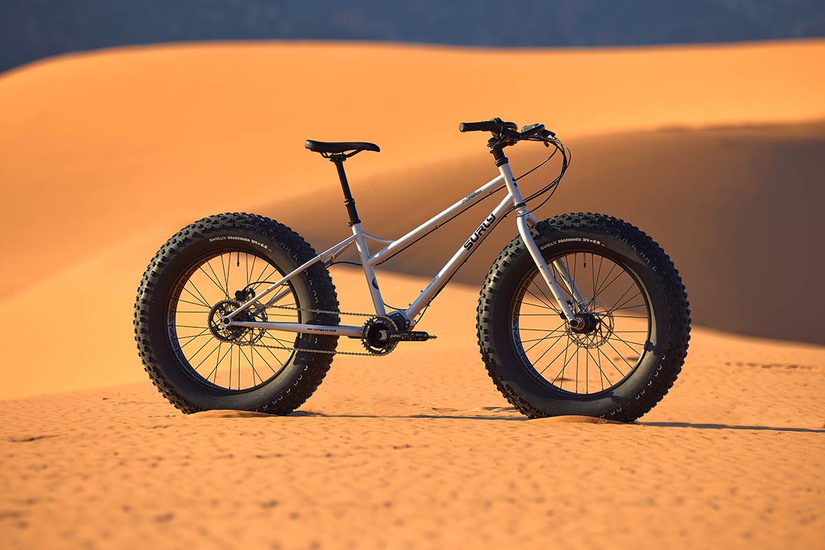 Surly Moonlander fat bike side view on sand dune