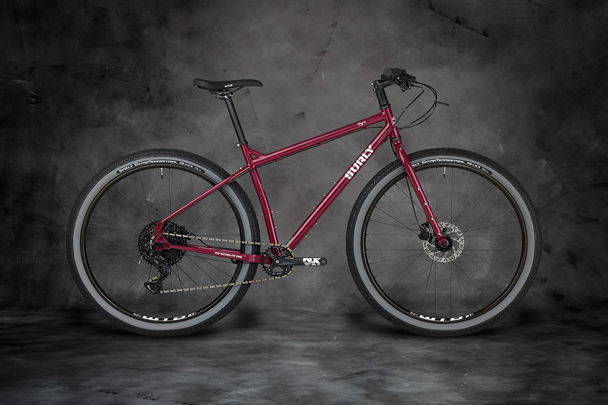Ogre bike side view on gray background, Fermented Plum color