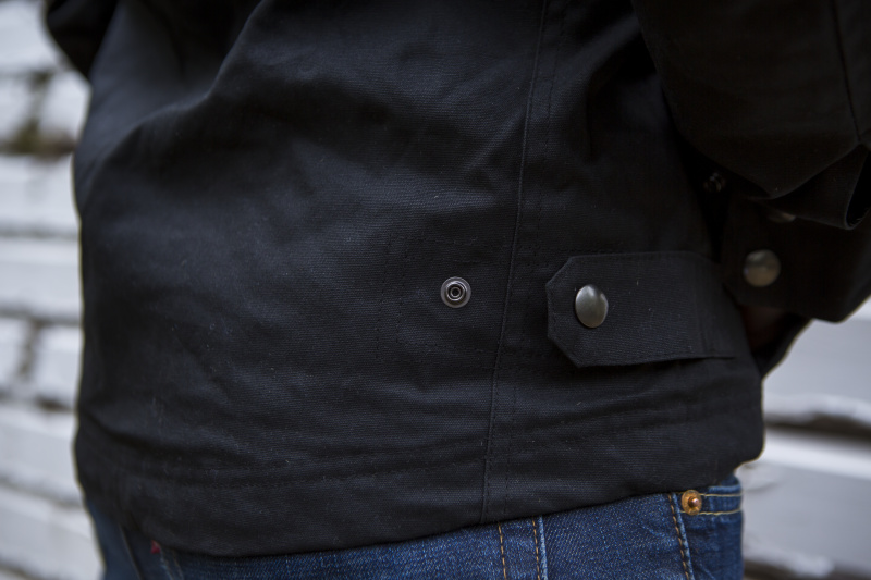 Surly V2 Waxed canvass jacket, black, side snap and hardware detail