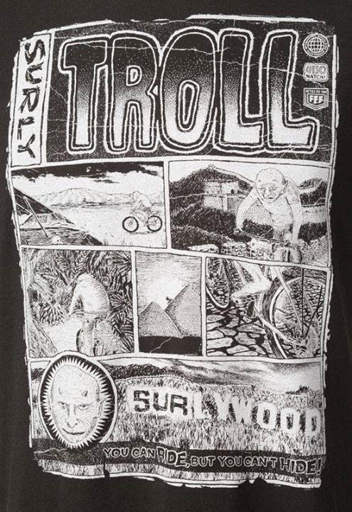 Front graphic of a Surly Bikes Troll t-shirt -  black - with blocks of different illustrations