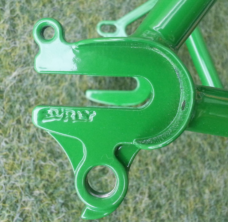 Surly Karate Monkey bike frame - green - horizontal dropout detail - right side view over a turf background