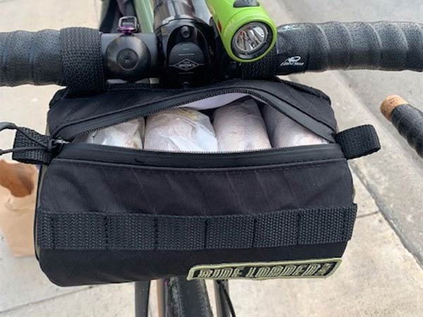 Midnight Special with handlebar bag filled with bagels