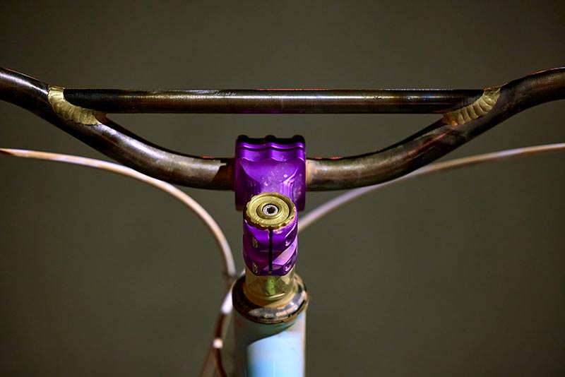 Detail of Paul's custom Surly Krampus handlebars, stem, headset, and top tube