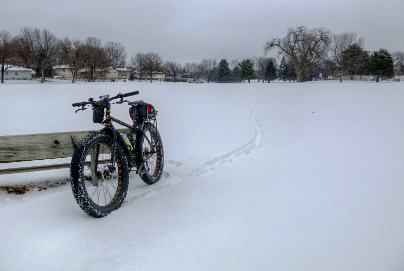 Front view of  Surly fat bike in a snowy field