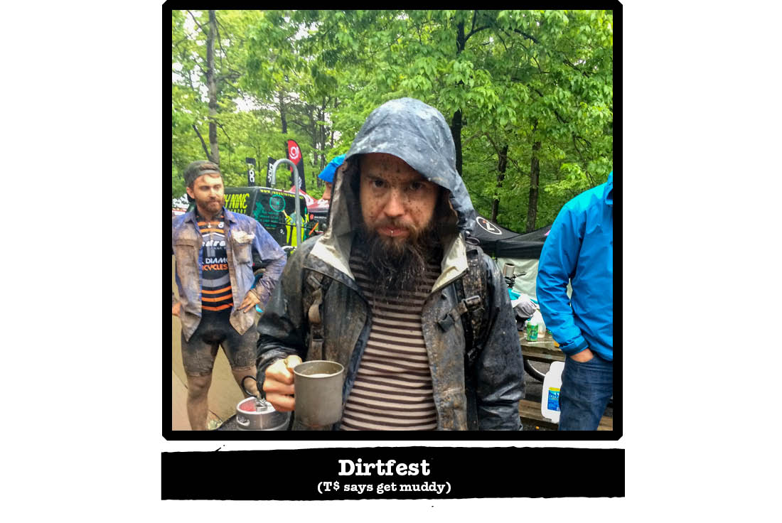 Front view of a person with a mud splashed face, with people and trees in the background - Dirtfest tag below image