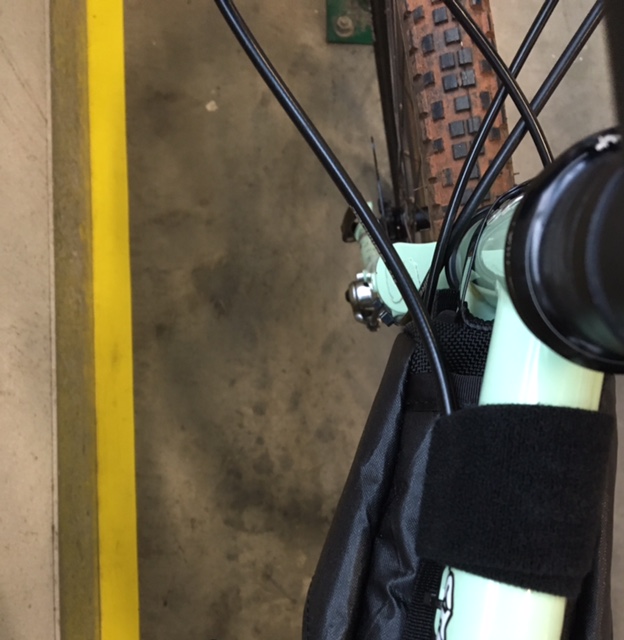 Surly Straggler-Check bag - black - downward view of the updated head tube attachment detail