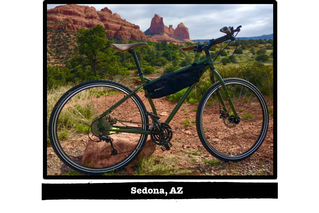 Right profile of a green Surly bike with desert trees and red mountain in the background - Sedona, AZ tag below image