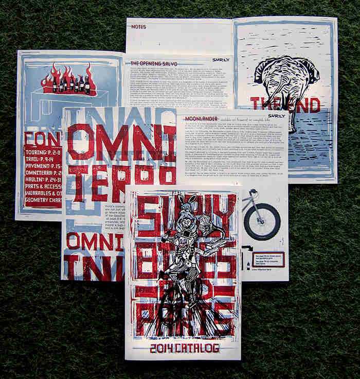 Downward view of front and back covers, with printed illustration them, used for Surly Bike catalogs
