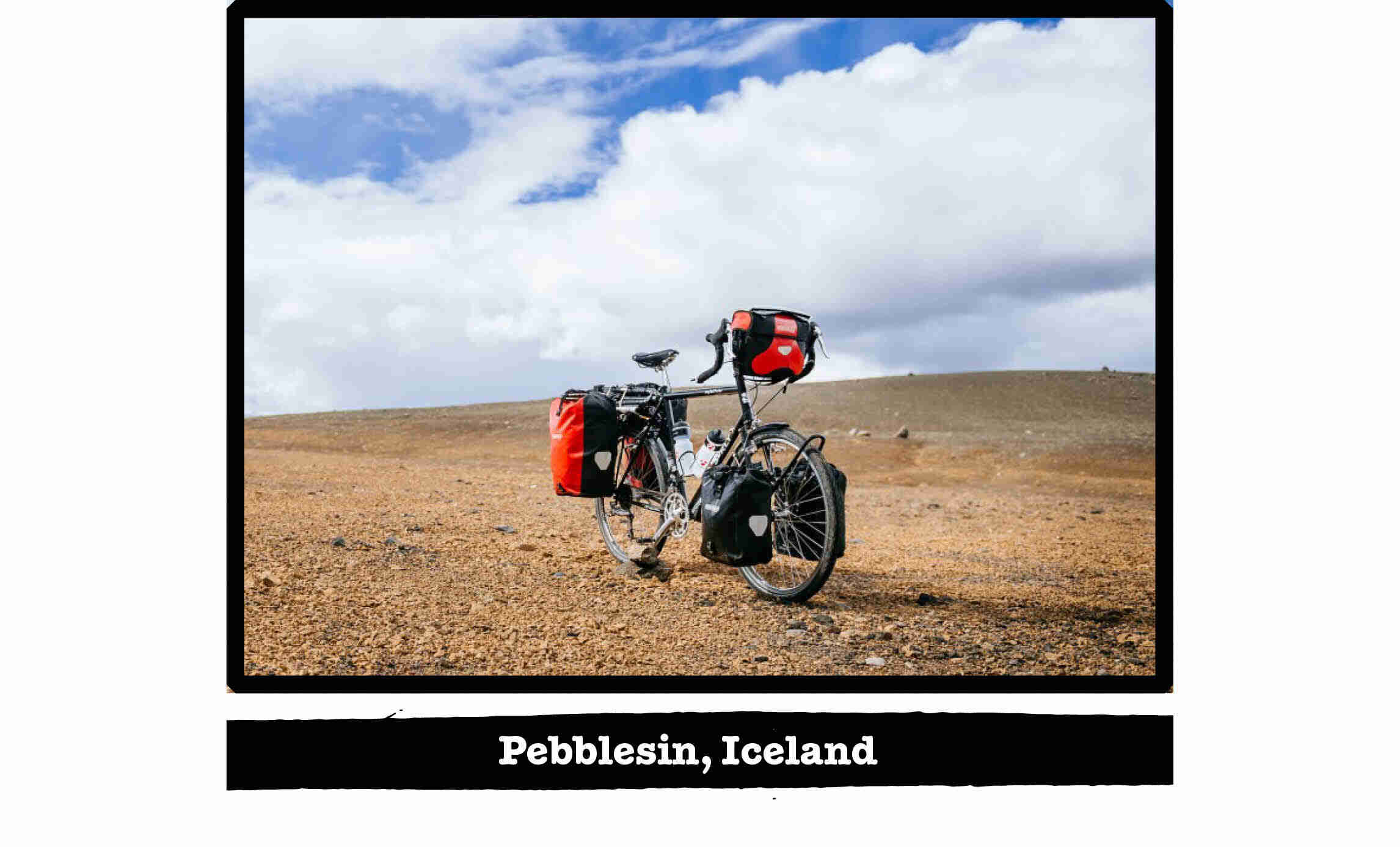 Right front of view of a Surly bike on a gravel field - Pebblesin, Iceland tag below the image