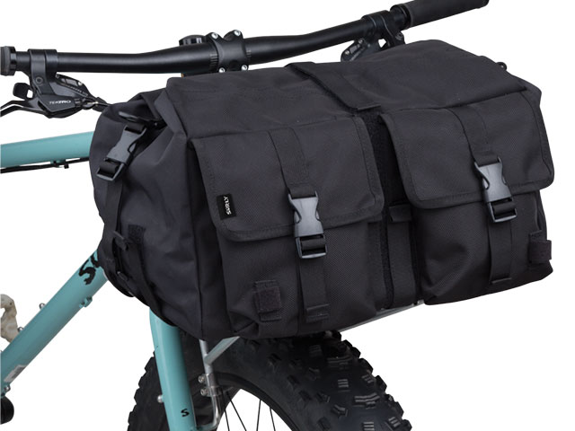 Surly Porteur House bag - black outside - attached to handlebar of a bike - closed front view