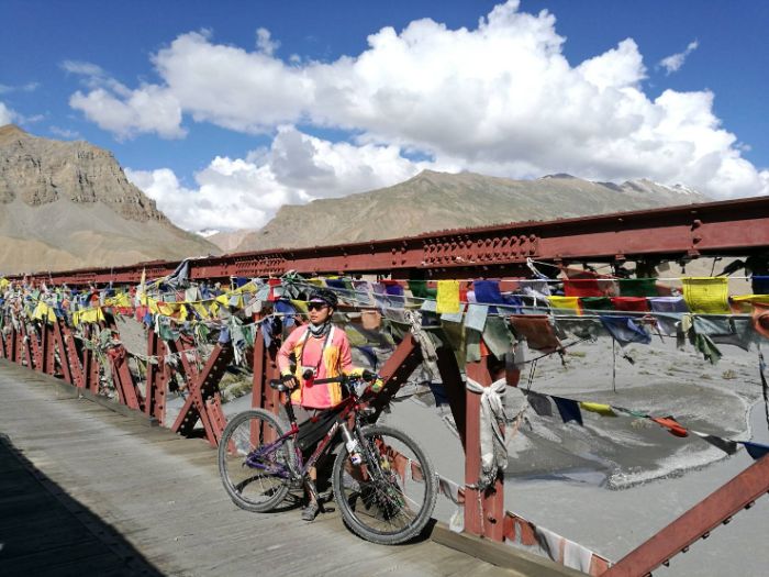 Immu Standing with flags at spiti