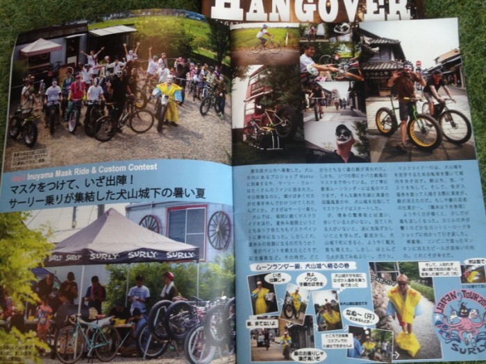 A magazine spread, showing cyclists, bikes, a Surly canopy and asian text