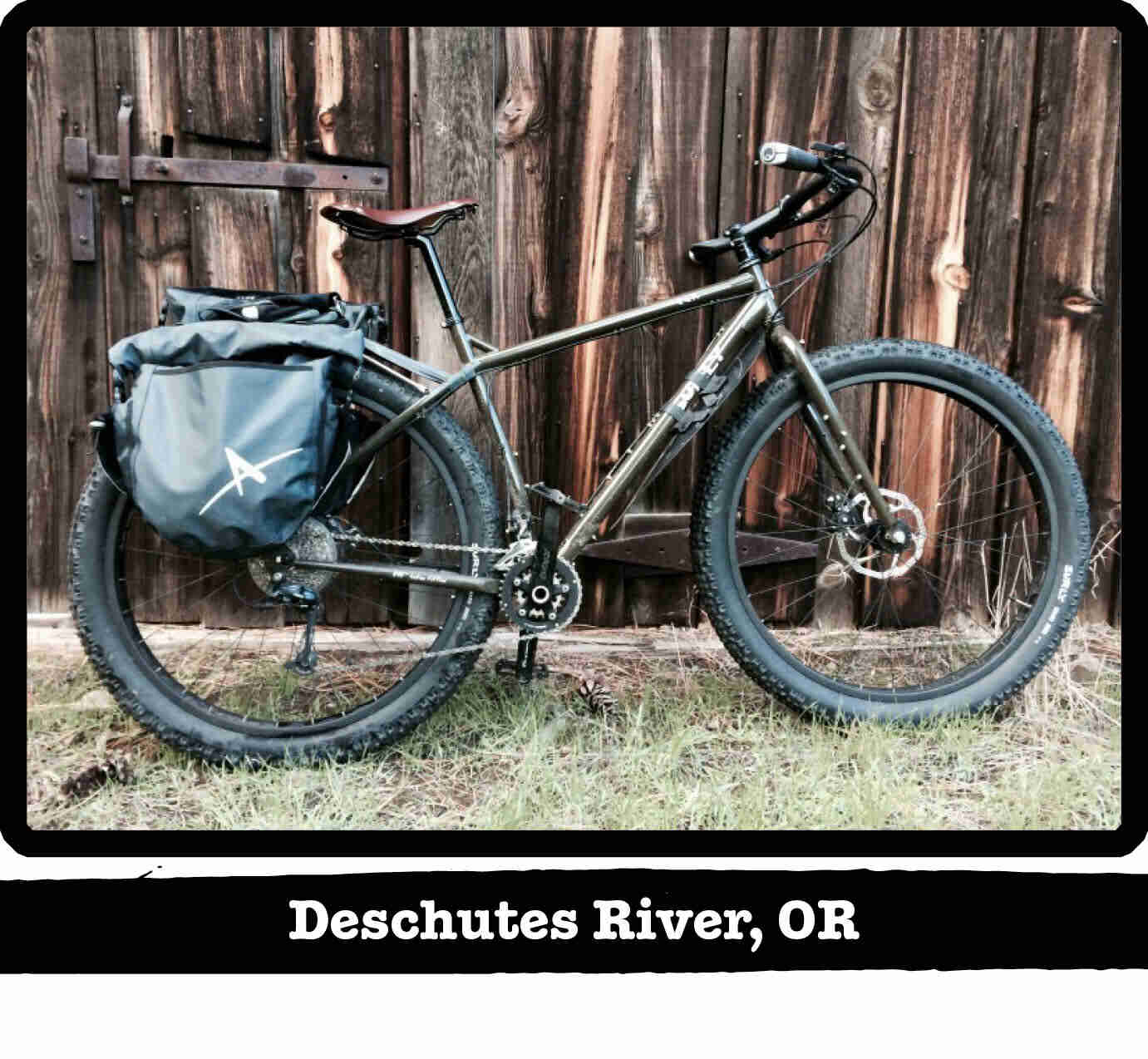 Right side view of a Surly ECR bike, leaning on a wood wall - Deschutes River, OR tag below image