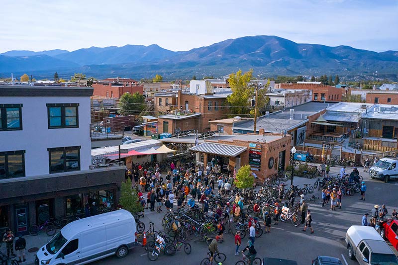 Single speeders gathering in town in morning