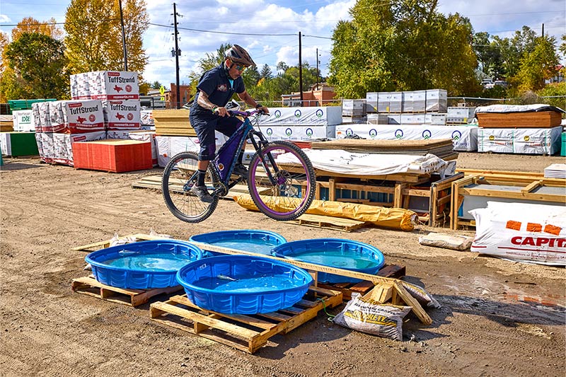 Single speeder jumping kiddie pools filled with water