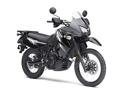 A Kawasaki KLR 650 Motorcycle - black - white background - front, right side view