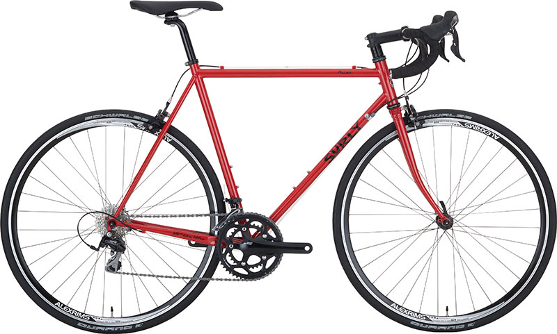 Red Surly Pacer complete road bike, red color with black components, side view on white background