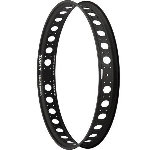 Front, right side view of a black Surly Rolling Darryl fat bike rim, against a white background