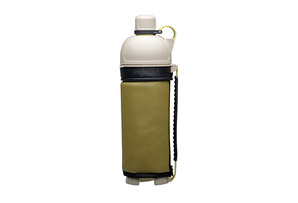 A Stanley Adventure carbonated drink bottle  - white and yellow - white background - front, vertical view
