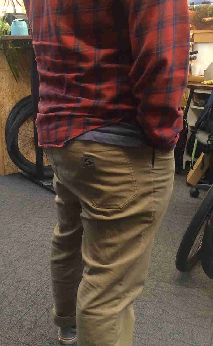 Rear view of a person wearing Surly V2 pants